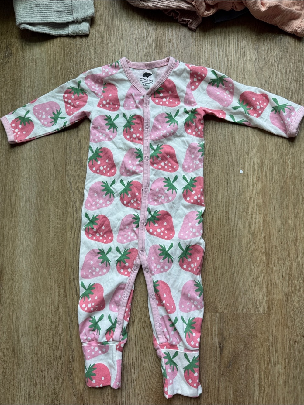 Kids Pink Strawberry Print Footie Romper. 100% organic cotton.